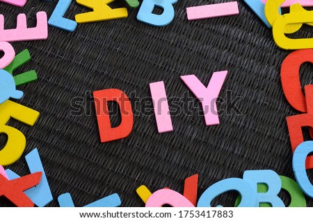 A closeup view of the acronym DIY for asserting the many Do It Yourself projects.