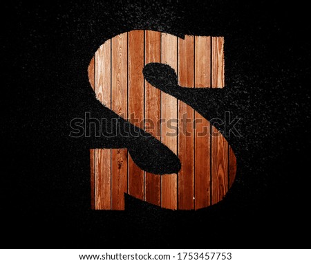 Latin letters made of wooden planks on a black background