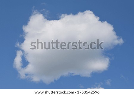 White fluffy cloud and blue sky 