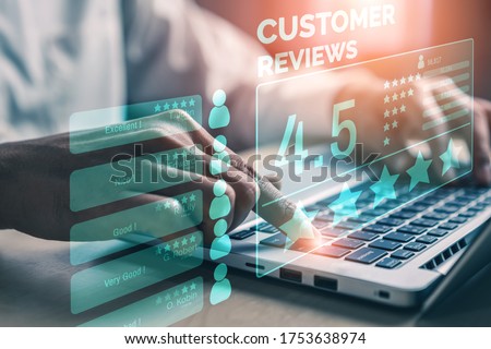 Customer review satisfaction feedback survey concept. User give rating to service experience on online application. Customer can evaluate quality of service leading to reputation ranking of business. Royalty-Free Stock Photo #1753638974