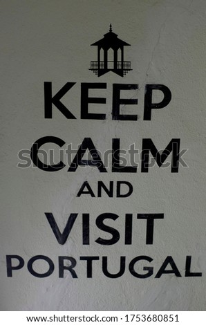 Written on the wall somewhere in Lisbon, Portugal: keep calm and visit Portugal.