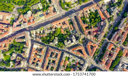 Milan, Italy. Roofs of the city aerial view. Cloudy weather, Aerial View, HEAD OVER SHOT   Royalty-Free Stock Photo #1753741700