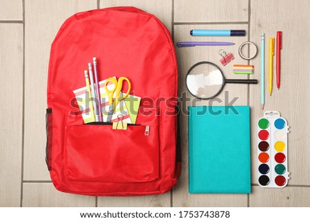 school backpack and school stationery top view. Concept back to school.
