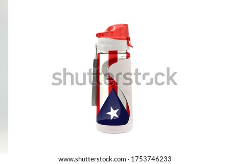 Sports Water Bottle with Puerto Rico flag on the bottle and isolated on a white background. Healthy lifestyle concept.