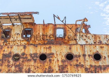Detail view of abandoned ship carcass in graveyard ships on the atlantic ocean coast... Royalty-Free Stock Photo #1753769825