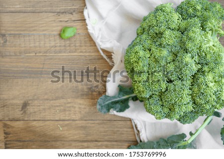 fresh broccoli on a wooden background