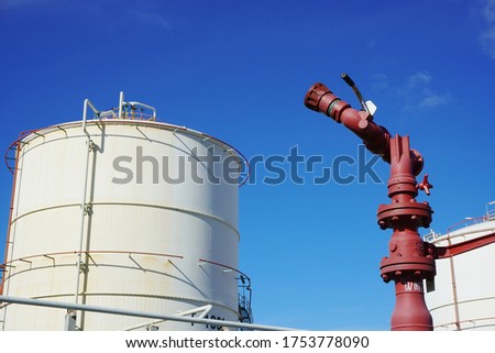 Fire hydrant that is installed in a chemical plant to preparation for emergency situations and background of chemical storage tanks.