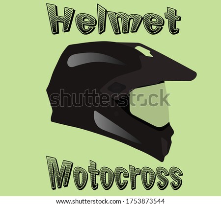motocross helmet on a green background and inscriptions