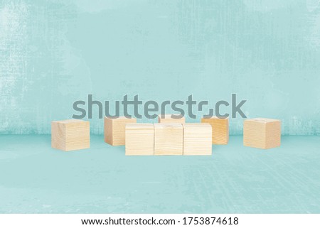 Blank wooden blocks on a stone countertop. The concept of content supplementation, several wooden cubes possible to enter content, place icons.