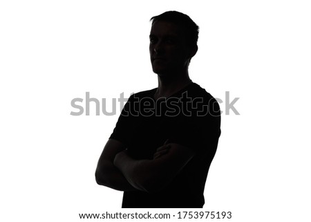 Photo of man's isolated silhouette with arms crossed Royalty-Free Stock Photo #1753975193