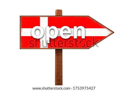 The inscription OPEN on the sign with the flag of Denmark. End of quarantine during the COVID-19 coronavirus pandemic in Denmark. Epidemic measures.