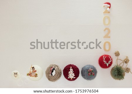 2020 New Year Festive Creative Cute Decorations White Background with Copy Space for Message. Flat Lay, Top View. Concept: Christmas & New Year Holidays.