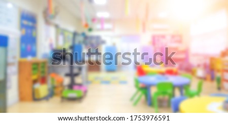 Kindergarten classroom school background. Class room for children students or nursery kids. Blur daycare preschool. Royalty-Free Stock Photo #1753976591