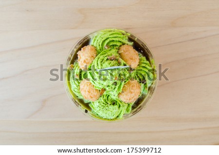 Green tea cake on the wood table