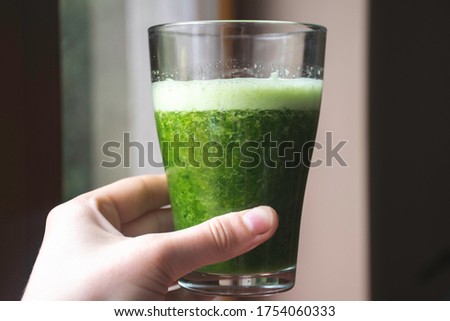 Picture of healthy green smoothie. Sirtfood concept.