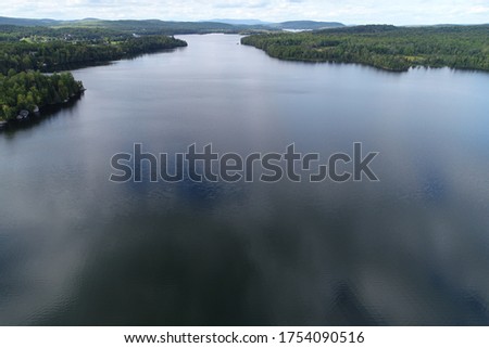 Major island on campion Lake aerial pictures from drone. Pictures represent the lake and the island with nearby cottage