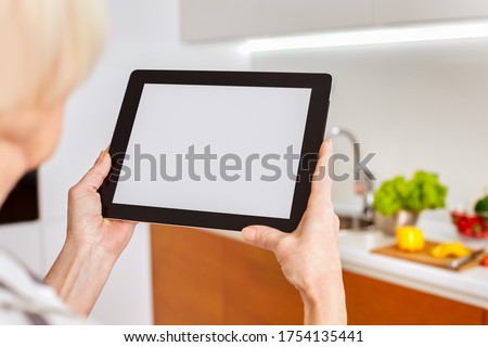 White screen monitor tablet, blank copy space place for text, space, mockup for icon home smart intellectual system. Network details lighting radiators appliances. Woman lady use smartphone to control