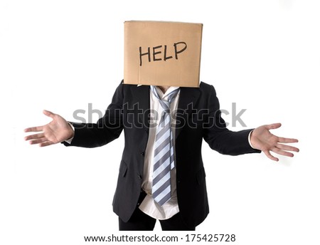 Business man asking for help with carboard box on his head isolated on white background