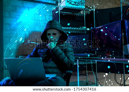 Hacker using laptop with binary code digital interface. Double exposure. Hacking and malware concept.