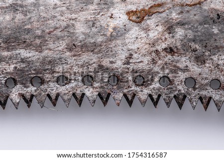 Picture of Close-up of old wood sawing saws on white background.