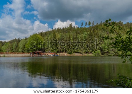 Bily Halstrov reservoir in west Bohemia in spring sunny fresh blue sky day