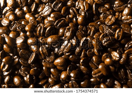 Coffee beans oil texture background