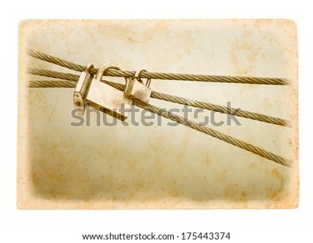 Concept of the love of vintage style - padlocks on the love bridge on paper background. Three locks - symbols of  marriage bond from new wedding traditions.