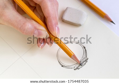  Drawing Jewelry Design. Drawing sketch jewelry on paper . Design Studio. Creativity Ideas. Royalty-Free Stock Photo #1754487035