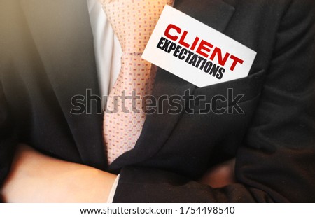 Businessman putting a card with text Claim Denied in the pocket. Insurance payment rejection. Business concept.