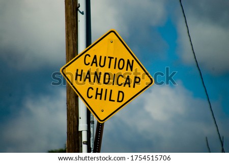 caution handicap child sign close to Portsmouth New Hampshire USA