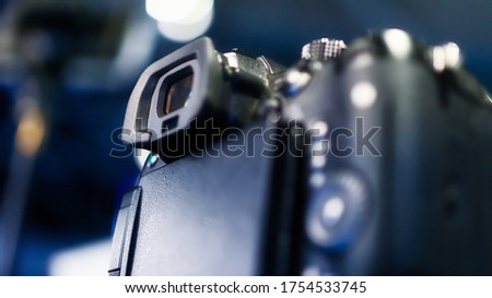 close up on media DSLR cameras in a recording studio ready for action with viewfinder in focus, all identifiable elements or trademarks were removed or cropped out