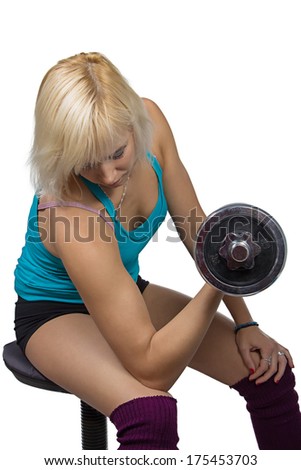 Athletic girl making exercises with dumbbell - isolated photo portrait