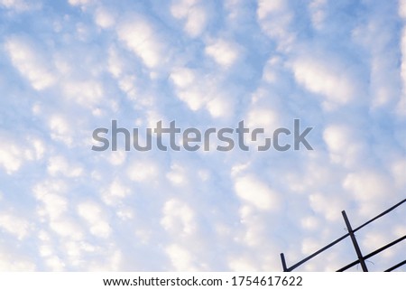 Picture of blue sky with tiny clouds