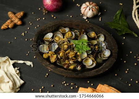 Remis unique indonesian traditional food. remis are small freshwater river shells. because the unique taste makes it popular