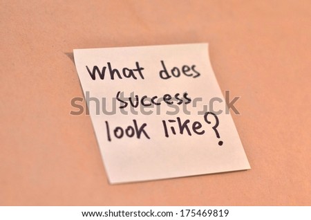 Text what does success look like on the short note texture background
