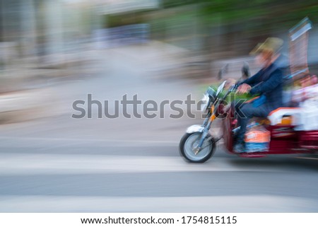 Motorbike transport as main ground city transportation in Kunming city of  Yunnan province of China, Asia