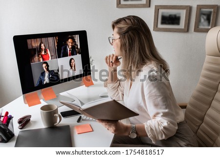 Video conference. Manager hold a business meeting on a computer from home