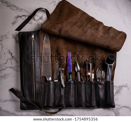 Set of professional cook tools. Special case of cook knives. View from above