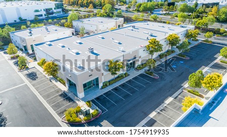 Aerial View Of Industrial Commerce Office Buildings. Royalty-Free Stock Photo #1754919935