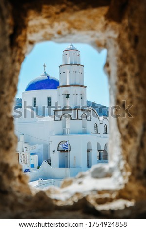 Santorini Island Oia Greece Europe, white village of Oia Santorini with old blue and white Greek churches at dusk Santorini Greece, white church looking out over ocean