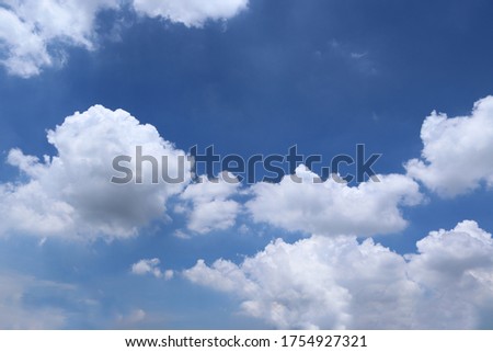 Blue sky and white cloud backgrounds and textures closeup for wallpaper interior design. From the nature create very beautifully.