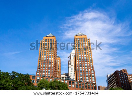 Classic New York City buildings in a summer blue sky day