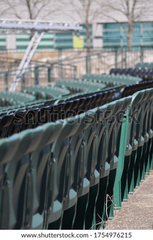 Rows of empty seats in a stadium