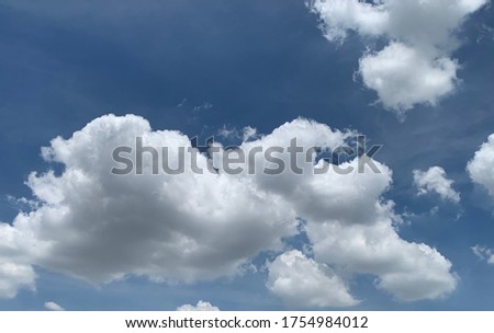 Stratocumulus clouds formation in a mid blue sky atmospheric beauty in nature at Bangkok, Thailand Royalty-Free Stock Photo #1754984012
