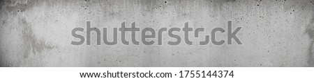 grunge concrete texture in old retro grey long format as panorama with dots holes and scratches in wall Royalty-Free Stock Photo #1755144374