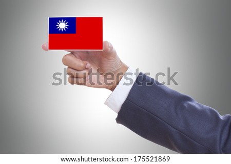 Businessman holding a business card with Taiwan Flag 