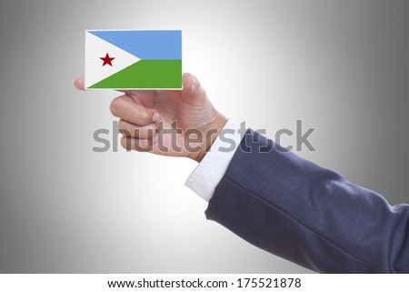 Businessman holding a business card with Djibouti Flag 