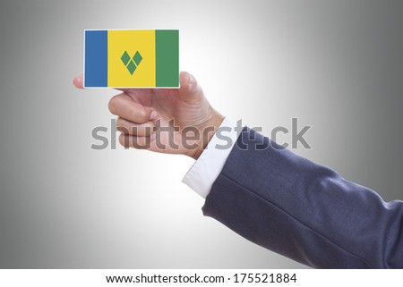 Businessman holding a business card with Saint Vincent and Grenadines Flag 