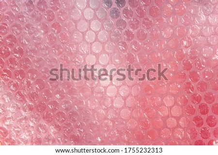 Pink bubble wrap or air cushion film, horizontal horizontal texture abstract for background