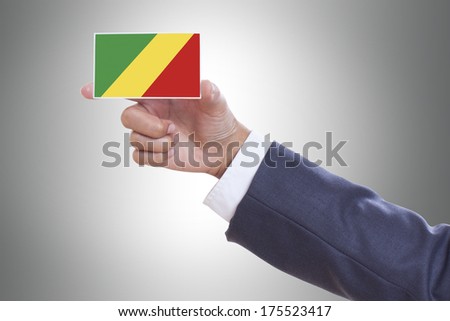 Businessman holding a business card with Congo Republic Flag 